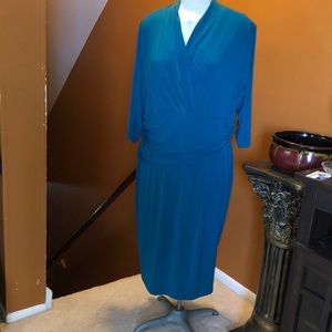 Teal/turquoise V/-neck dress.